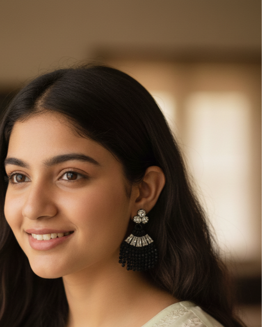 Woman wearing a white top with a blurred background